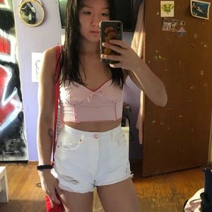 White high waisted denim shorts.